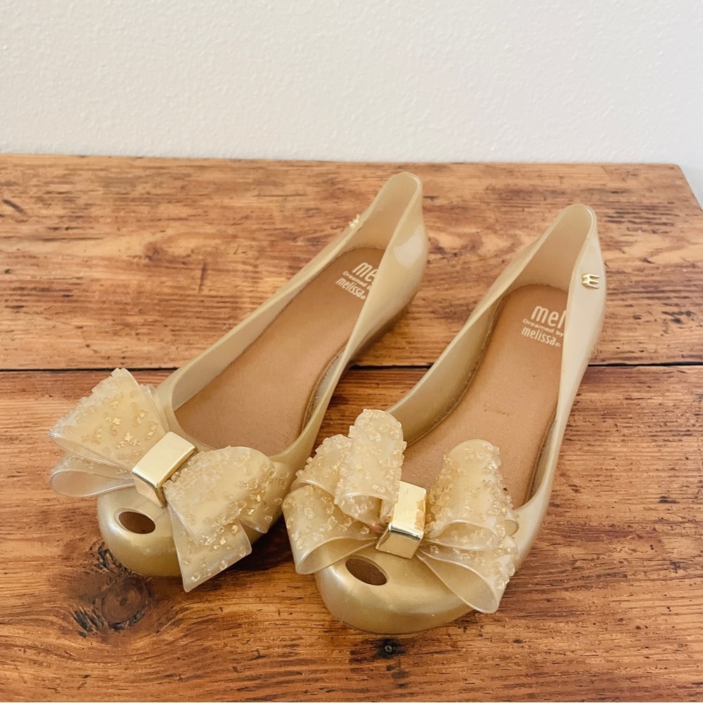 Mel by Melissa Mini Mel Dreamgirl Gold Gel Bow Flats